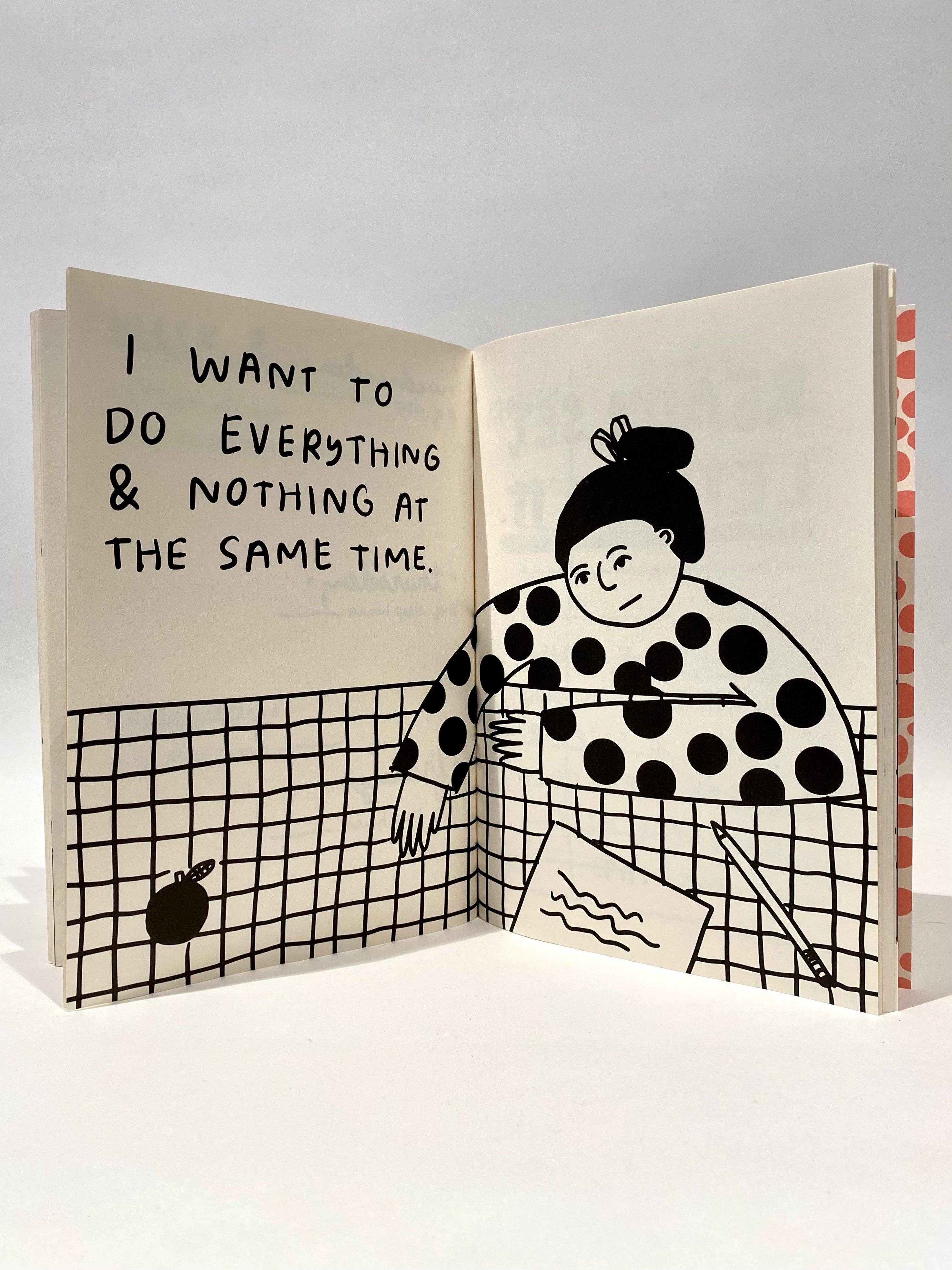 Open book with illustration of a person in a polka dot shirt and text 'I want to do everything & nothing at the same time'.