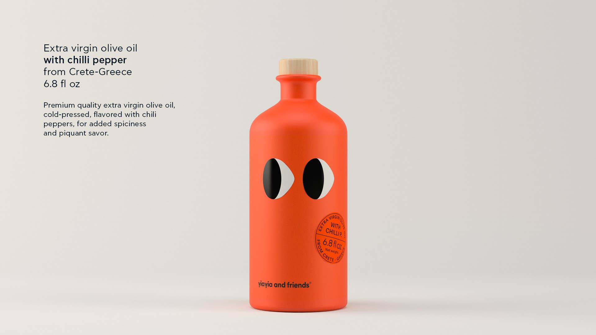 Orange bottle with black eye design on a light gray background