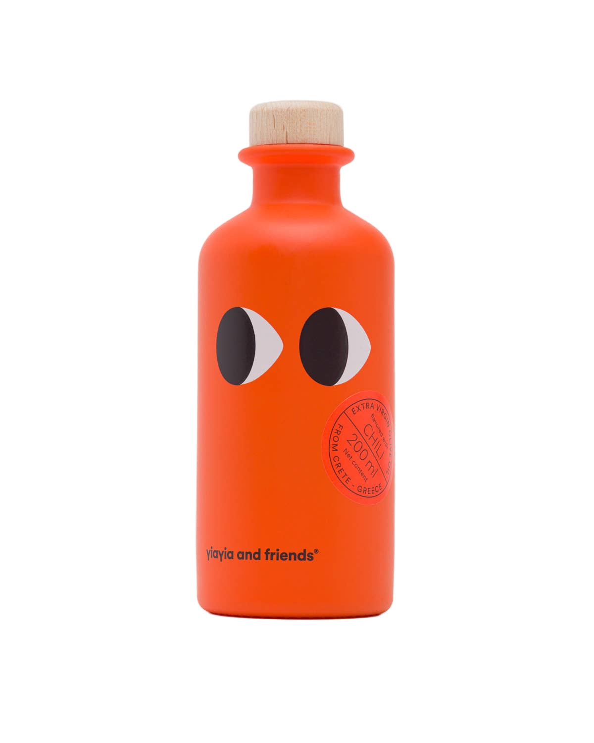 Orange bottle with black eye design and wooden cap on a white background